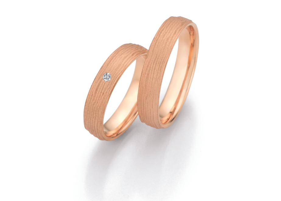 Trauringe aus 14 Karat Roségold, Damenring mit Brillanten in 0,035 ct. © Collection Ruesch